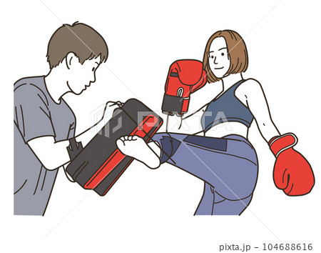 格闘技のキックをする若い女性とトレーナー 104688616