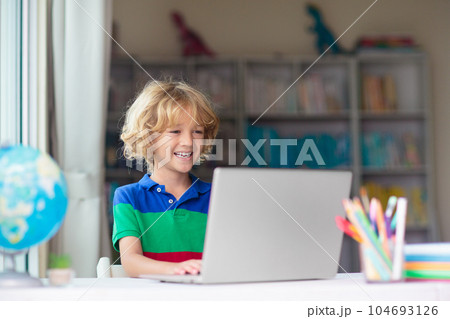 Online remote learning. School kids with computer. 104693126