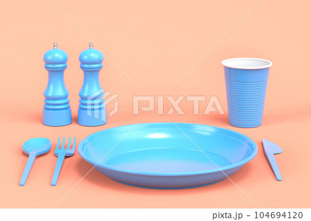 Set of disposable utensils like plate, folk, spoon,knife, cup and pepper mill 104694120