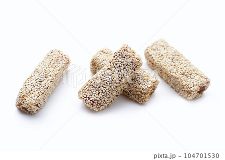 White sesame rolls with peanut. Sweetened dessert 104701530