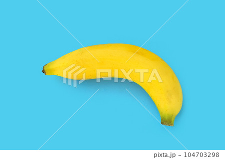 Banana fruit on blue background. Banana fruit on blue background. 104703298