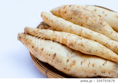 Sweet potato on white background. 104703676