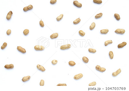 Raw peanuts on white background. 104703769