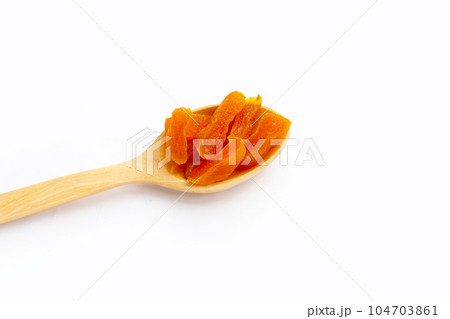 Dried apricots on white background. Dried apricots on white background. 104703861