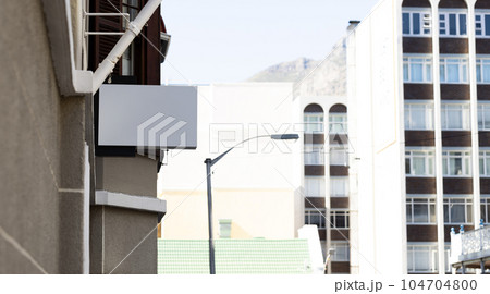 Blank sign fixed to building wall with copy space Blank sign fixed to building wall with copy space 104704800