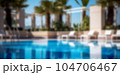 Blurred background of an outdoor swimming pool near the hotel. 104706467