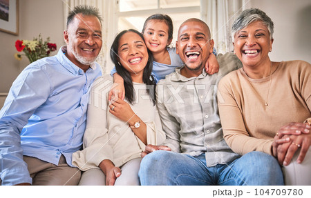 Big family, funny portrait and smile in home living room, bonding and laughing. Face, grandparents and happy children, mother and father relax, having fun and enjoying quality time together in house. 104709780