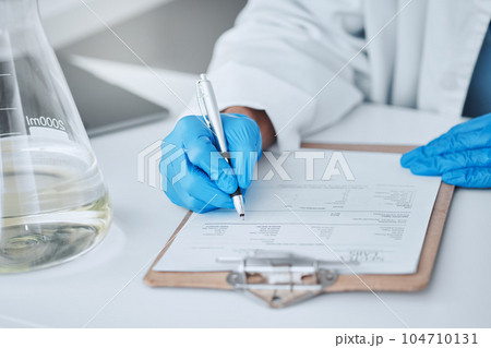 Medicine, writing and science with hands of man in laboratory for report, pharmacy and medical. Checklist, healthcare and data with closeup of scientist and clipboard for research, vaccine and study 104710131