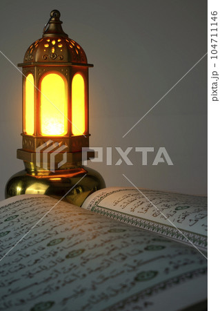 Quran and Arabic lamp with bright light 104711146