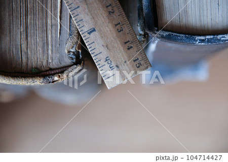 Book on old wooden table and a ruler. Back to school background. 104714427