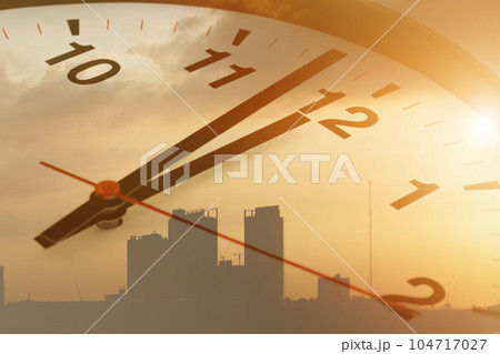 Time clock afternoon overlay city building for business times working hours concept. 104717027