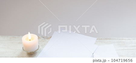 Envelope and paper on white wooden table Envelope and paper on white wooden table 104719656