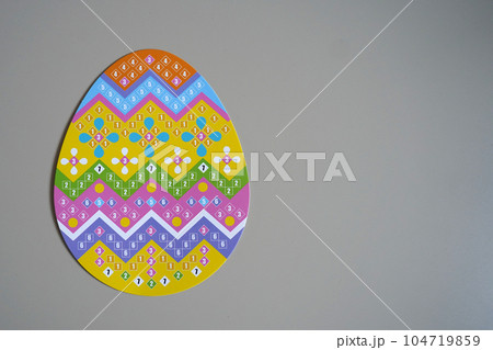 Children's Easter craft. Child's drawing of Easter eggs on white background. Children's Easter craft. Child's drawing of Easter eggs on white background. 104719859