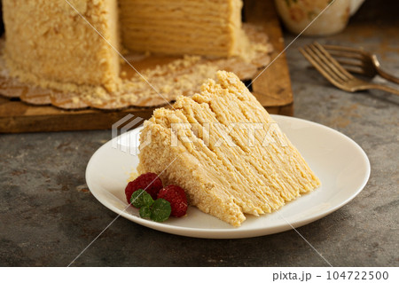Napoleon layered cake with macarons and raspberry 104722500