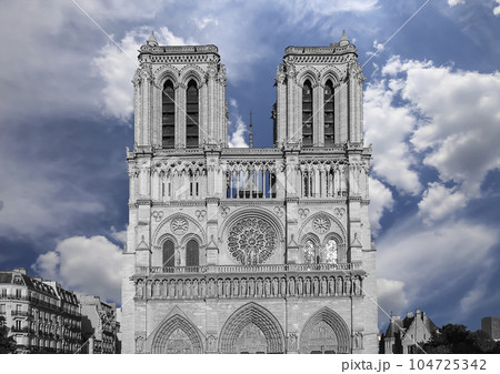 Notre Dame de Paris (against the background of sky with clouds), also known as Notre Dame Cathedral or simply Notre Dame, is a Gothic, Roman Catholic cathedral of Paris, France Notre Dame de Paris (against the background of sky with clouds), also known as Notre Dame Cathedral or simply Notre Dame, is a Gothic, Roman Catholic cathedral of Paris, France 104725342