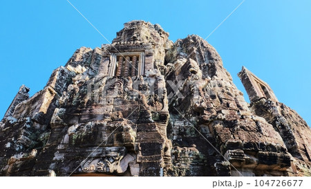 The main building of the Bayon Temple, a significant landmark from the Khmer Empire in Cambodia. 104726677