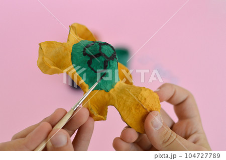 Step by step diy process. Step 4- using a brush and gouache, we paint the figure. Creativity, crafting. Zero waste concept. Step by step diy process. Step 4- using a brush and gouache, we paint the figure. Creativity, crafting. Zero waste concept. 104727789