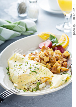 Crab omelette with potatoes for breakfast Crab omelette with potatoes for breakfast 104730400