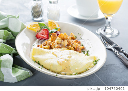 Crab omelette with potatoes for breakfast 104730401