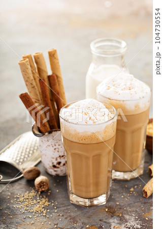 Coffee latte or cappuccino with spices 104730554