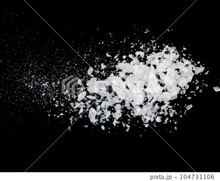Ice Cubes explosion flying, crystal clear ice wave floating, fall down in air. Ice Brick crack cube is frozen water healthy thirsty. Black background Isolated high speed shutter, freeze stop motion 104731106
