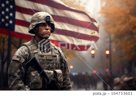 Serious soldier in camouflage uniform against the background of the American flag on Veterans Day. 104733601
