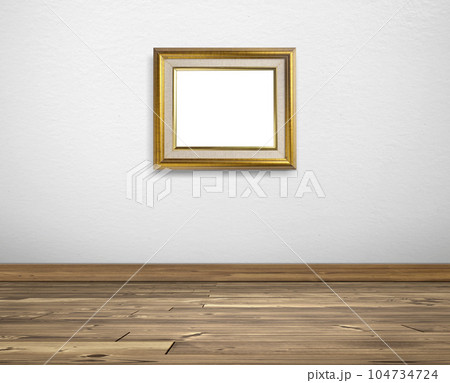 Golden picture frame on white walls and wooden floors 104734724