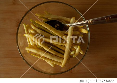 Yellow and green kidney beans cooking 104738077