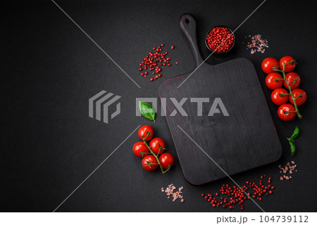 Ingredients for cooking cherry tomatoes, salt, spices and herbs Ingredients for cooking cherry tomatoes, salt, spices and herbs 104739112