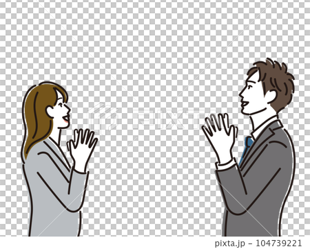 向かい合って喜ぶスーツ姿の男女 104739221
