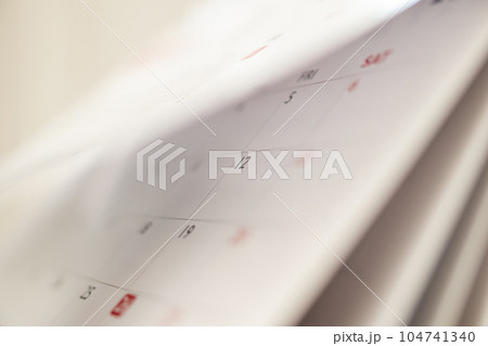 Abstract blur calendar page flipping sheet close up background business schedule planning appointment meeting concept 104741340