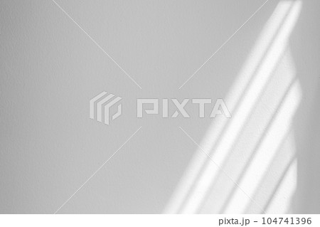 Window shadow drop on white wall background 104741396