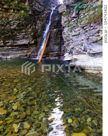 the Bukhtivets waterfall in the Carpathian Mountains the Bukhtivets waterfall in the Carpathian Mountains 104743602