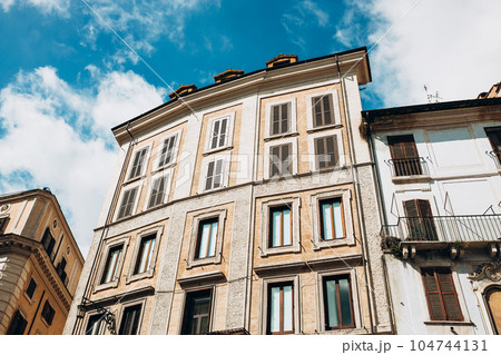 Architecture of Rome. A building with the characteristic facade and windows. Summer time 104744131