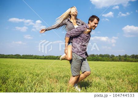 Couple in love enjoying tender moments during sunset . Emotional concept of relationship. 104744533
