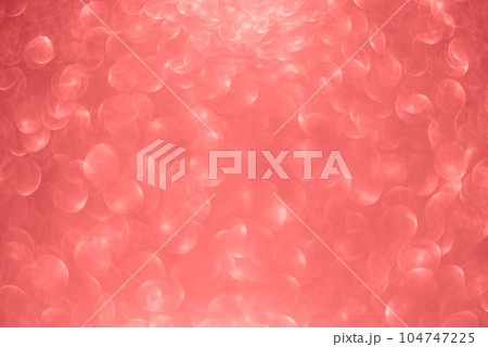 Abstract background coral rose tones. Glitter coral background. Color of 2019 concept. pink glitter texture christmas abstract background. Defocused abstract holidays lights on background. 104747225