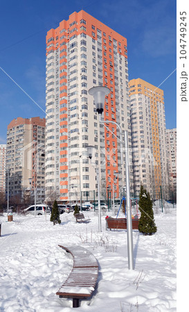 Kiev, Ukraine February 13, 2021: Urban high-rise Navoi apartment building with lanterns 104749245