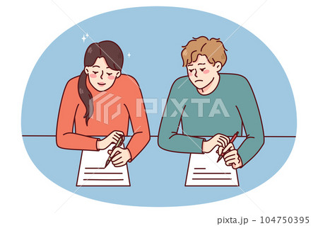 Boy cheating on school exam 104750395
