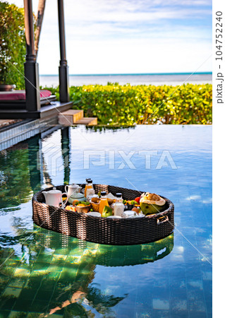 Floating breakfast in pool in Lamai beach resort in Koh Samui, Thailand 104752240