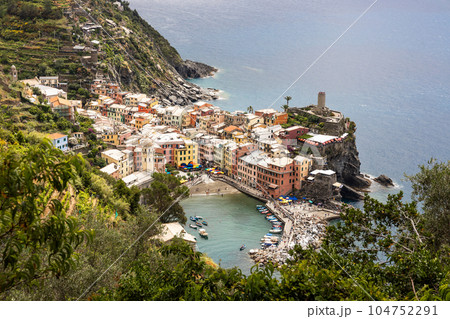 Close aerial view of Vernazza village along trekking trail from Monterroso, one of the five villages along Cinque Terre hiking trail, Italy 104752291