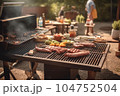 A man with a barbecue plate at a party between friends. Food, people and family time concept. 104752504