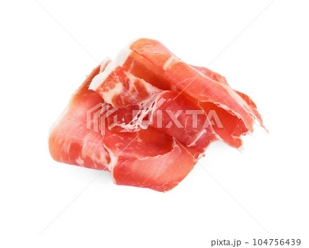 Slices of tasty prosciutto on white background Slices of tasty prosciutto on white background 104756439
