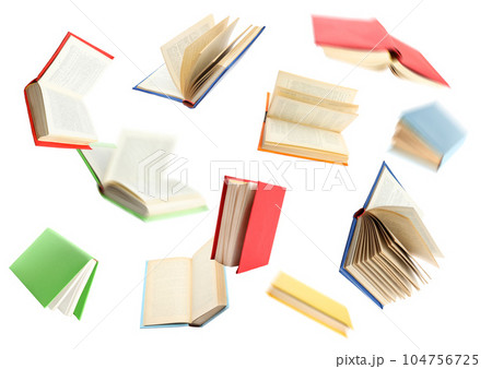 Colorful hardcover books flying on white background 104756725