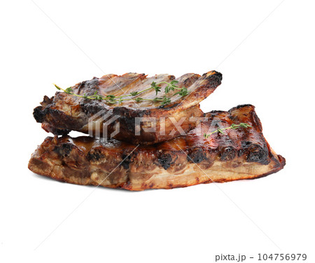 Tasty grilled ribs with thyme isolated on white 104756979