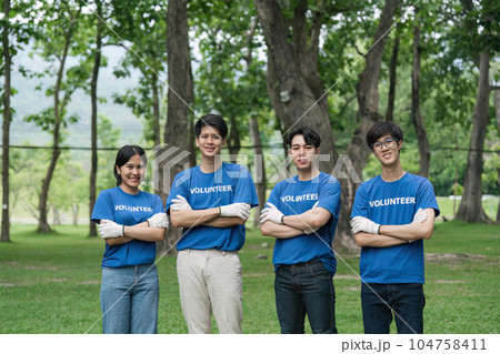 volunteers charity, group of volunteers join together to cleanup ,collect garbage, separate waste. concept for earth day volunteers charity, group of volunteers join together to cleanup ,collect garbage, separate waste. concept for earth day 104758411