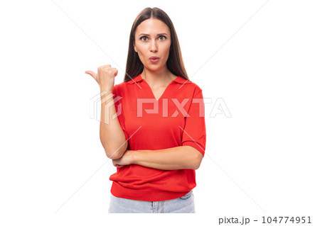 portrait of a cute young european brunette lady in a red t-shirt actively gesturing with her index 104774951