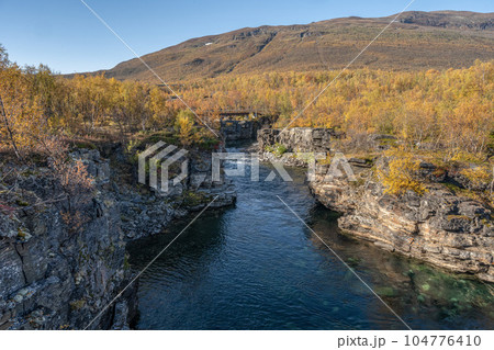 Autum Abisko Canyon River Abiskojakka National Park, Norrbottens, Norrbottens Lapland landscape north of Sweden 104776410