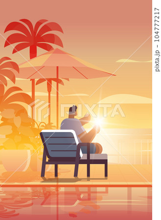 man relaxing at tropical luxury resort hotel beach swimming pool and poolside seating area summer vacation concept 104777217