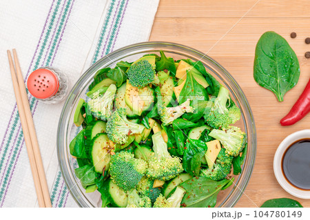 Fresh Green Salad of Avocado, Broccoli, Spinach and Cucumber Fresh Green Salad of Avocado, Broccoli, Spinach and Cucumber 104780149