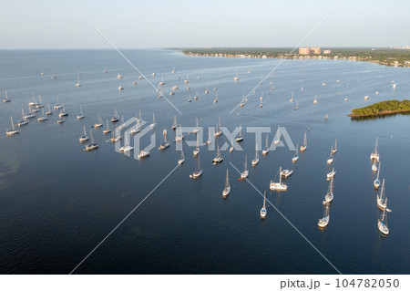 Aerial view of boats moored off Dinner Key Marina in Coconut Grove, Florida. 104782050